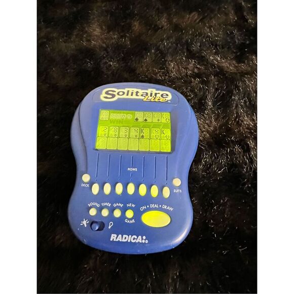 Radica 1997 Solitaire Lite Handheld Electronic Game